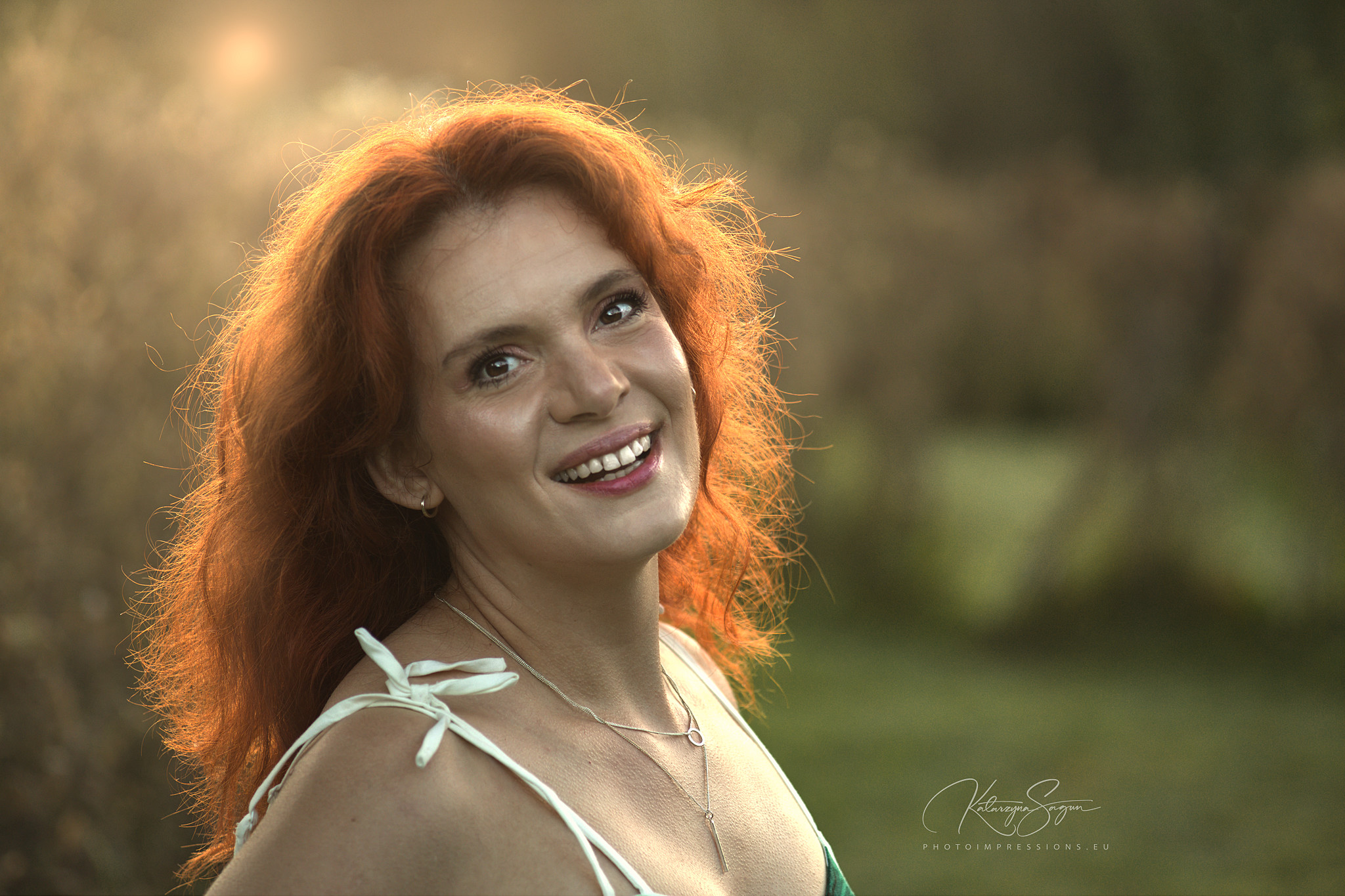 Wide landscape portrait from Iceland with model and forrest background.
