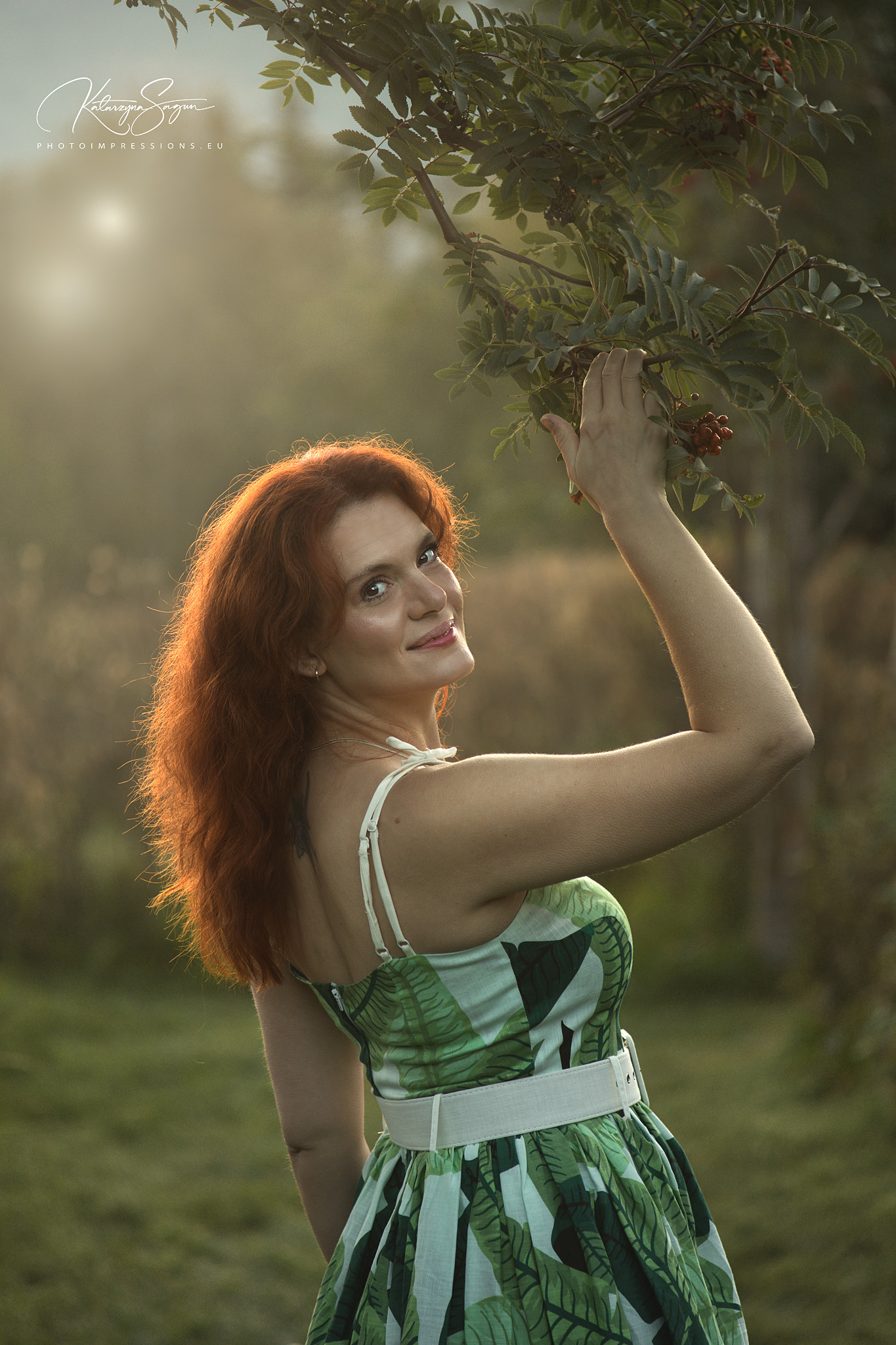 Artistic outdoor portrait session in Iceland with woman and golden light.
